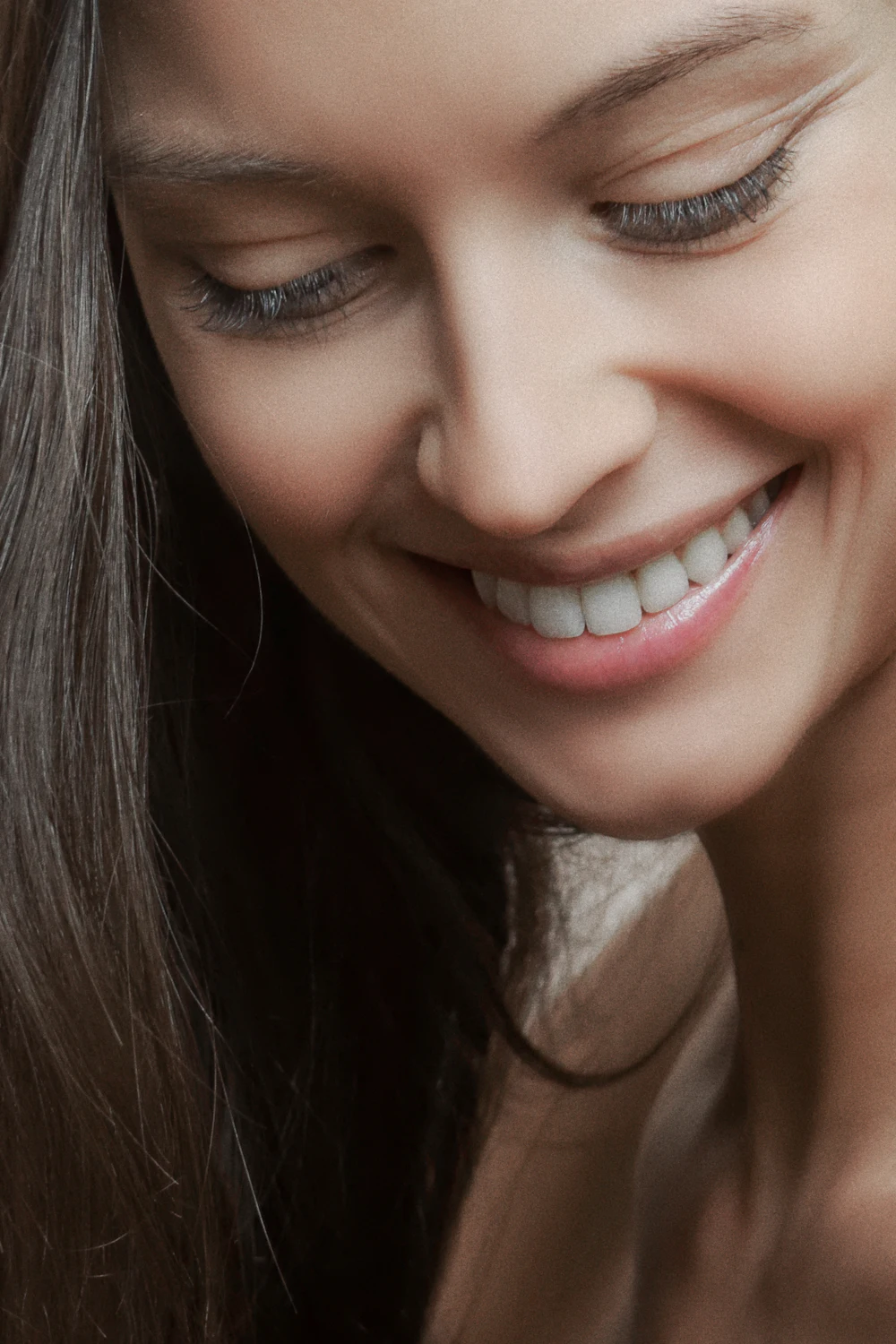 Patient smiling during a smile design consultation
